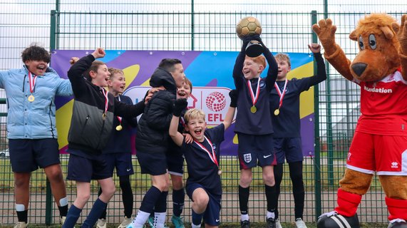 St. Edward's Primary School celebrate with the cup
