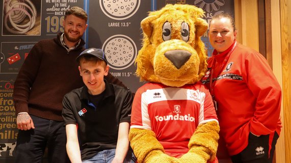 Matthew Duck celebrates his employment at Dominos Pizza