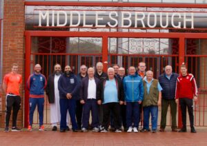 FFIT group pose for a photo outside the Ayresome Gates
