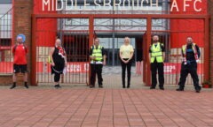 Head of MFC Foundation Heelna Bowman greets the five walkers who raised money for the Foundation by walking from Rockliffe to the Riverside