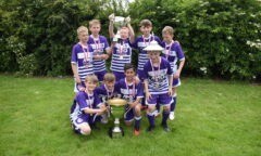 Boys winners in the 2024 Wilf Mannion Cup, Galley Hill, display their trophy